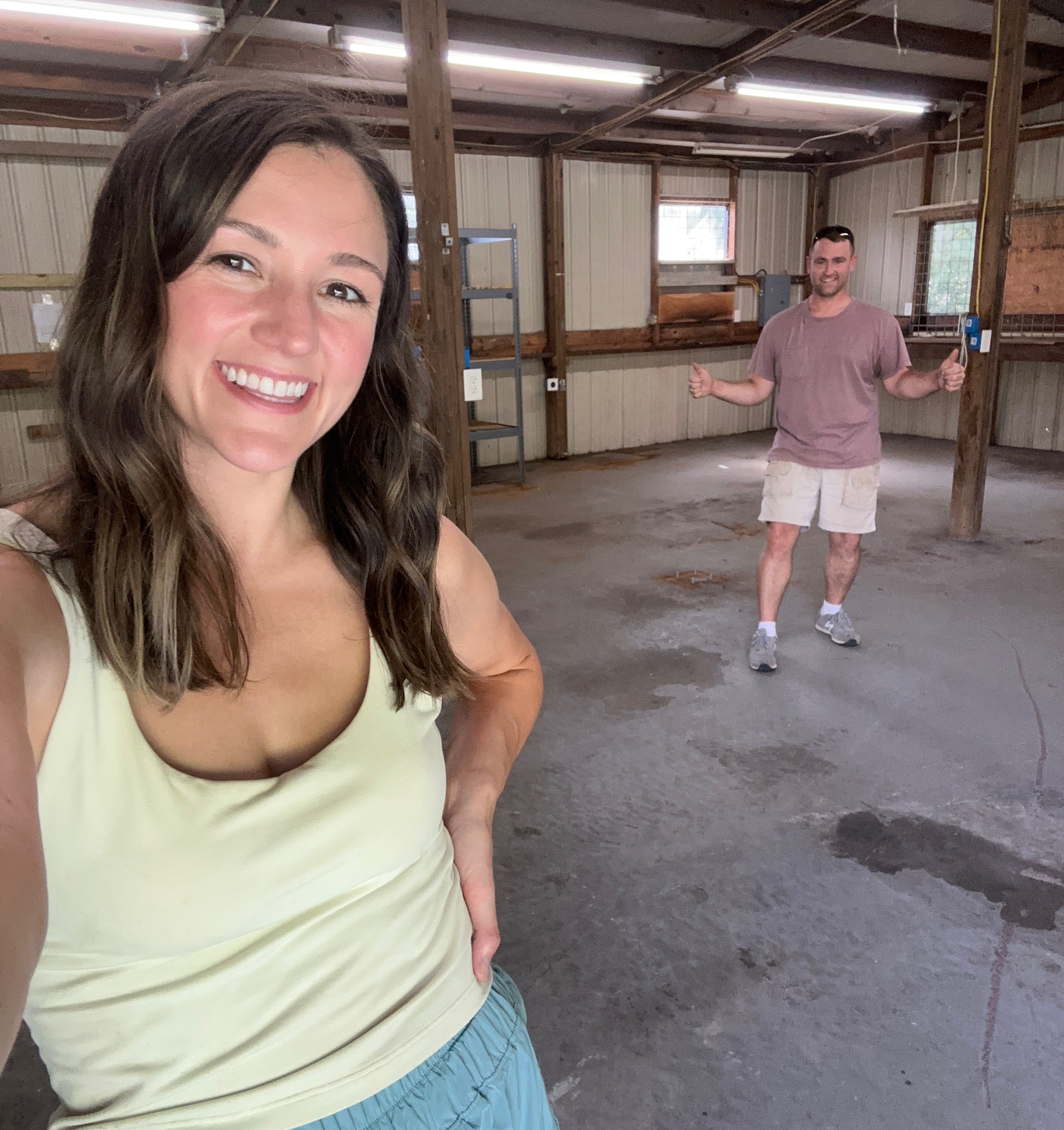 Matt + Hill with new rented shop before we moved in.